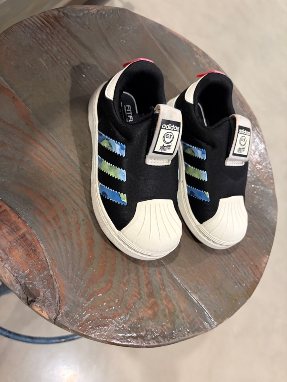 adidas Kids Black Slip-On Sneakers with Blue & Green Stripe Accents